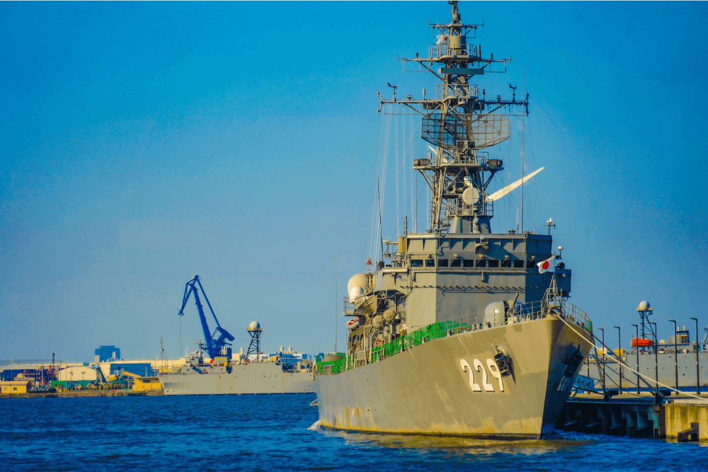 navy warship at harbor
